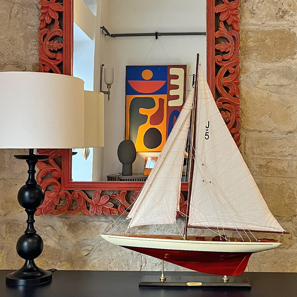    CARVED BELL MIRROR, ORANGE